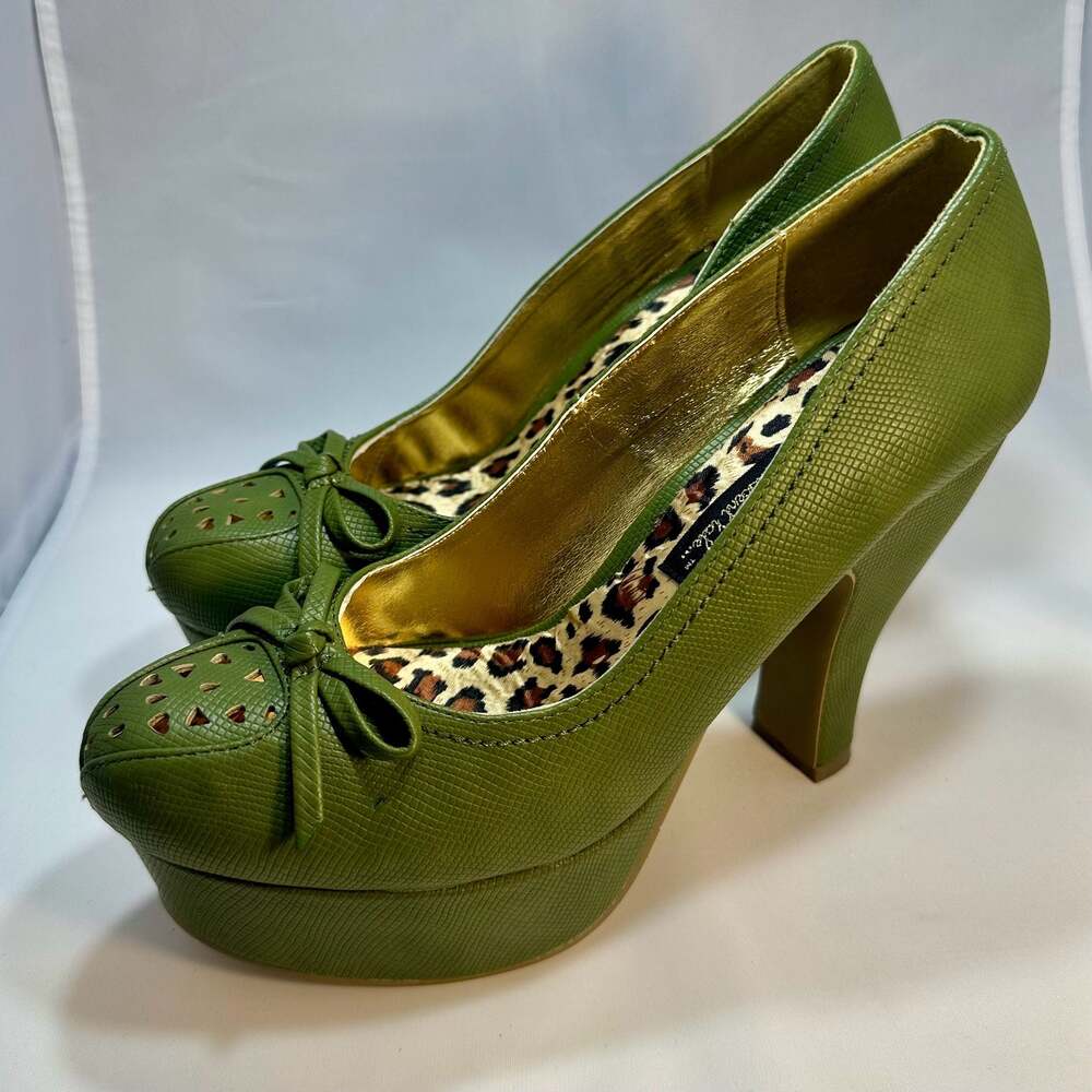 But Another Innocent Tale Celery Green Perforated Bow Platform Heels with Leopar